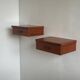 Vintage Scandinavian teak wall-mounted bedside tables.