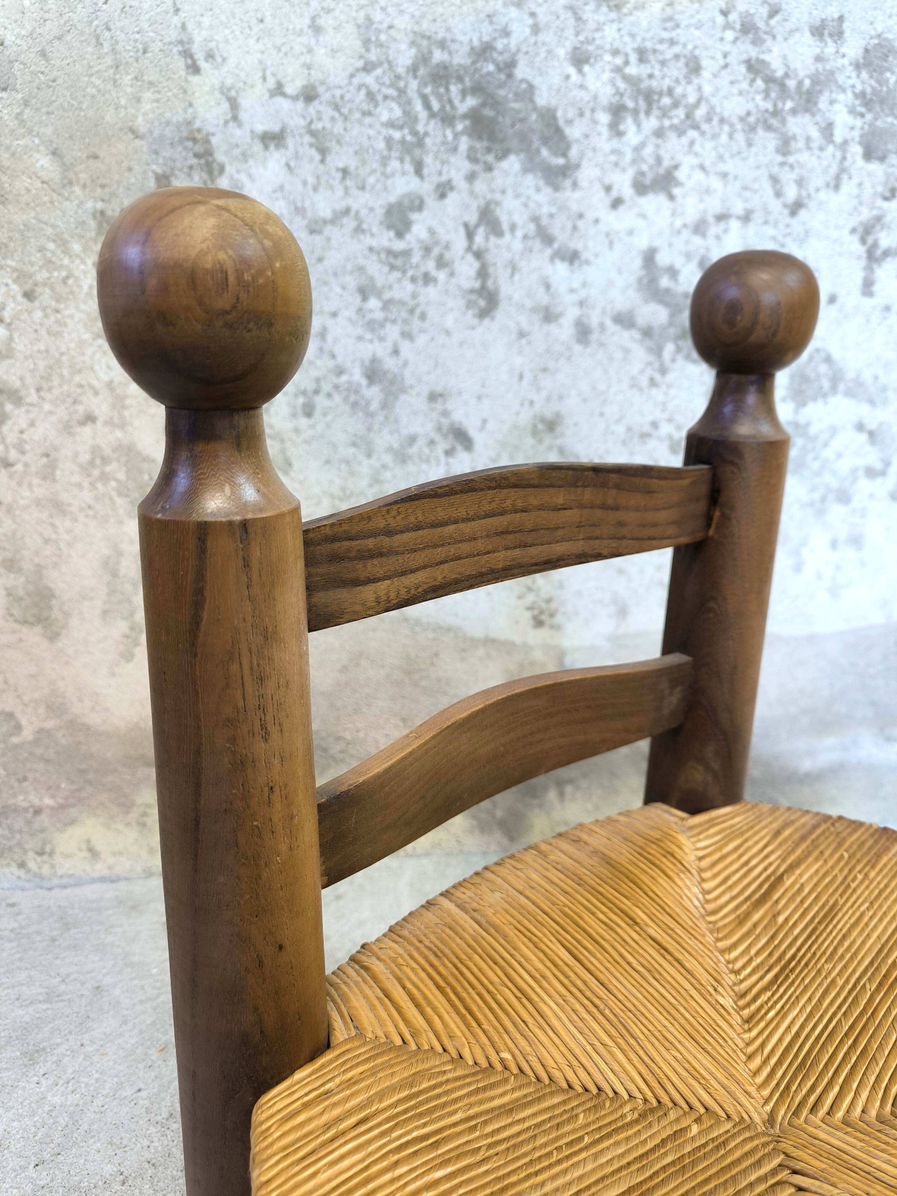 Vintage low chair in wood and straw