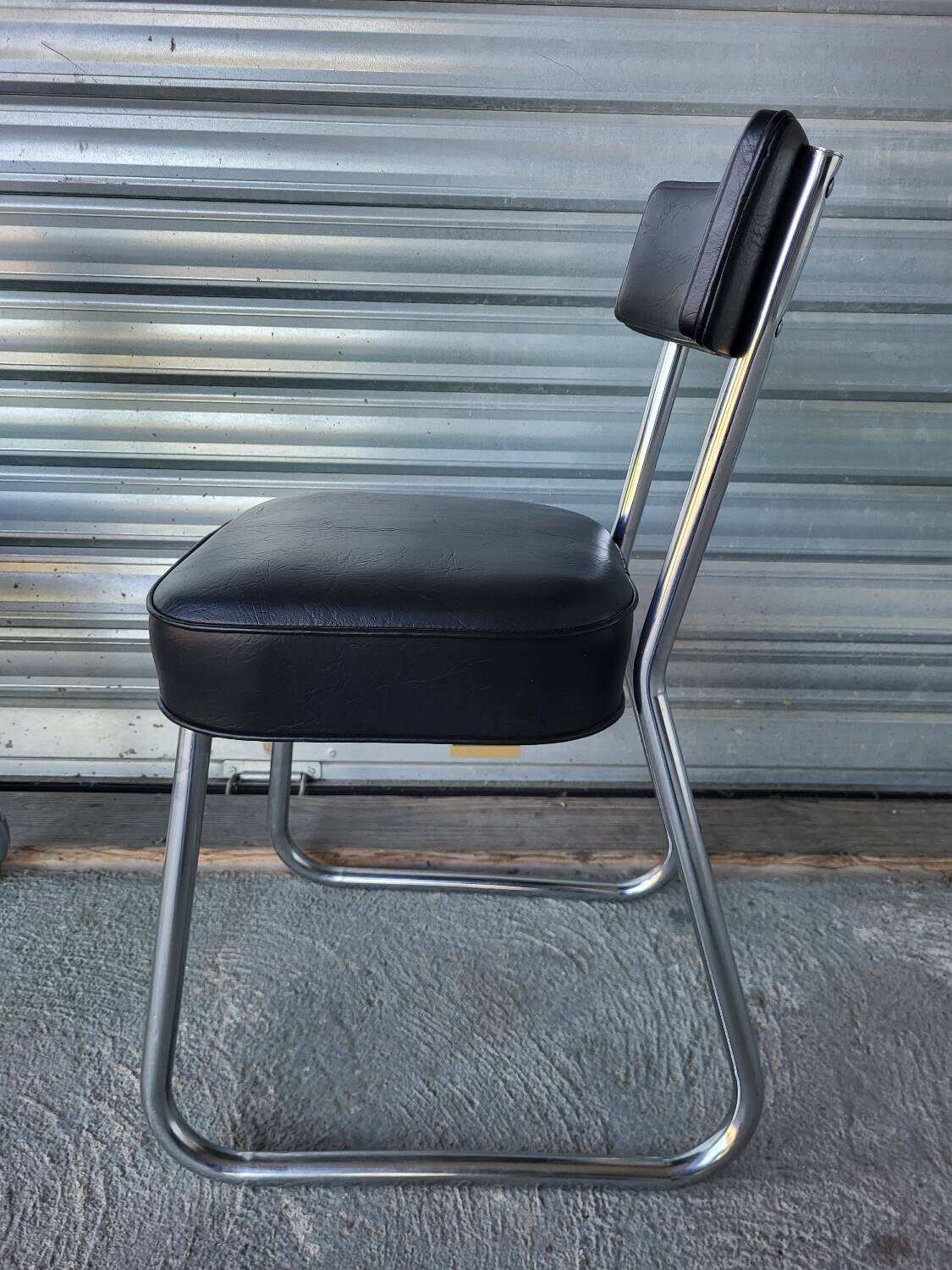 Pair of vintage black and chrome leatherette office chairs in very good condition