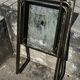 Folding garden or bistro table in khaki sheet metal from the early 1950s.