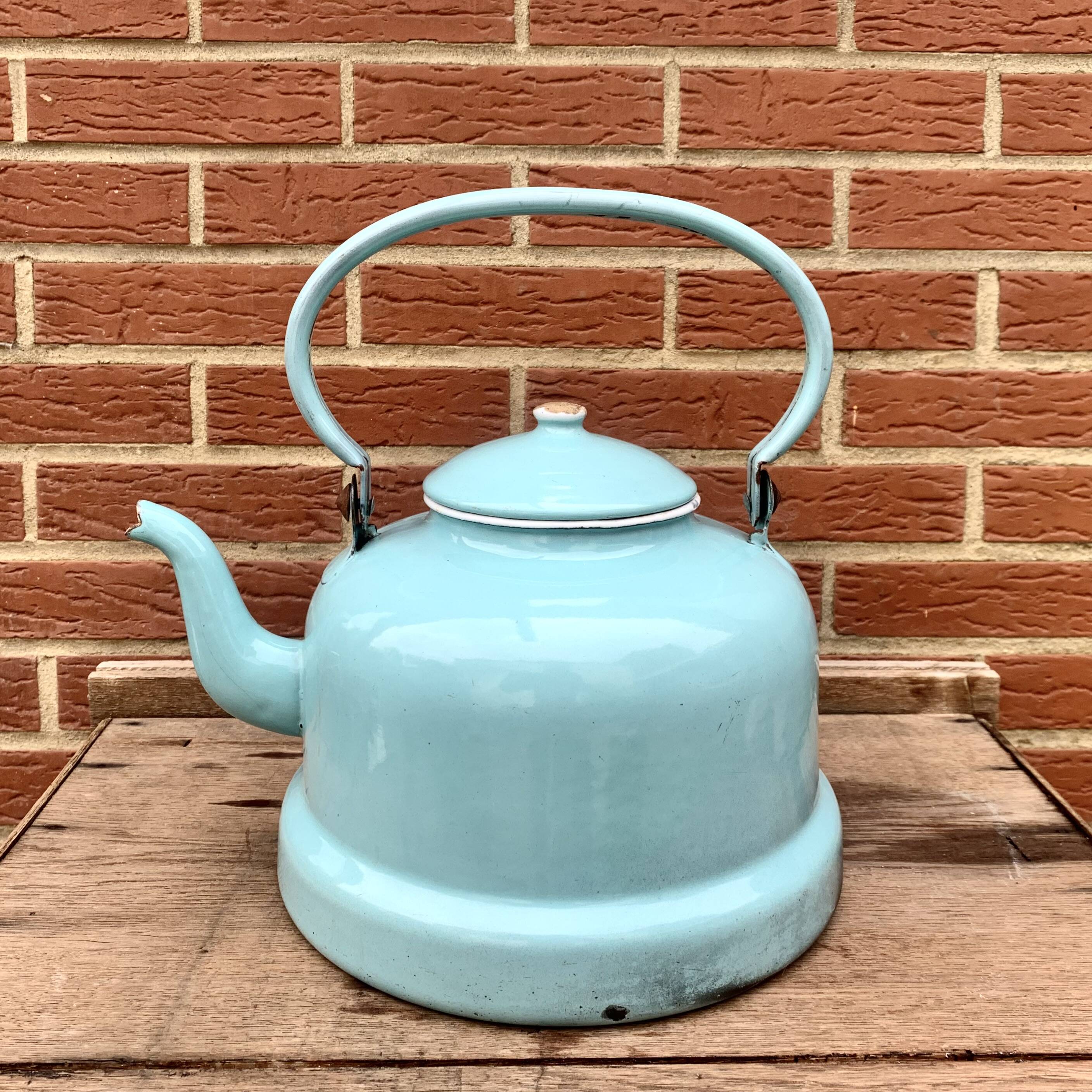 Large vintage kettle in blue enameled sheet metal