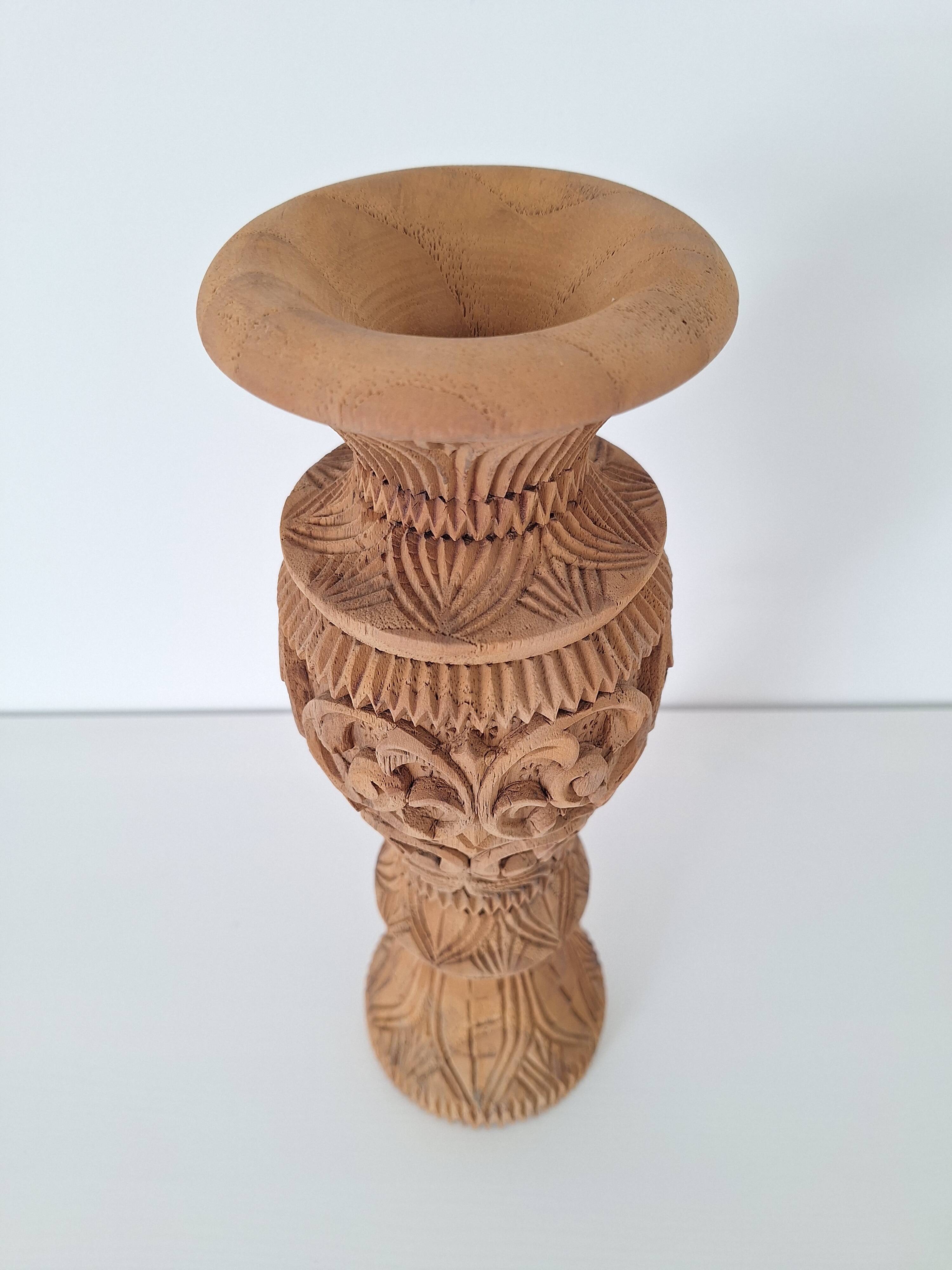 Carved solid wood vase