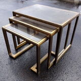 Pull-out tables in brass