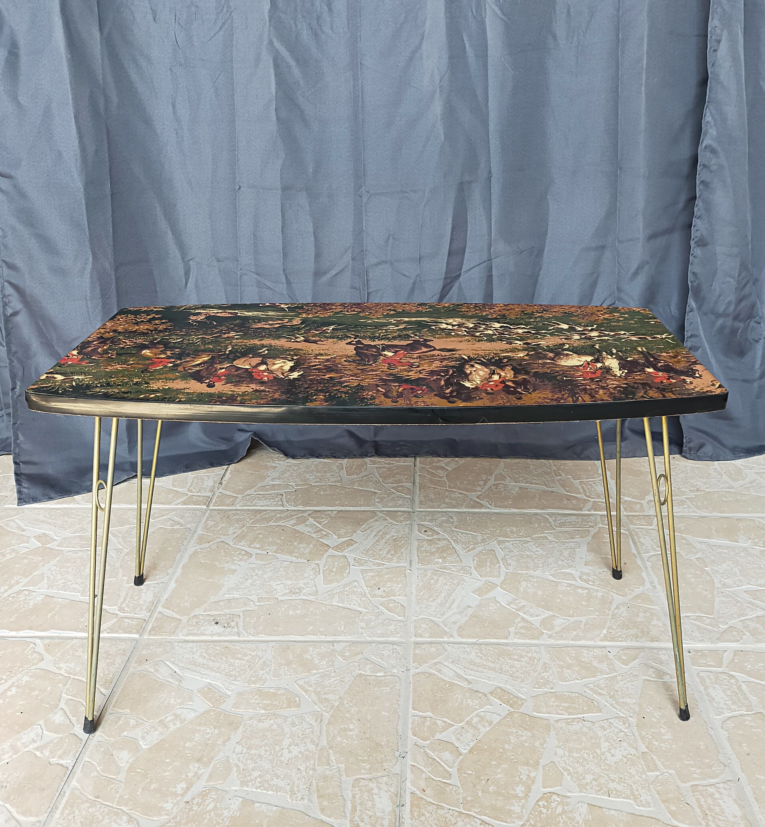 Vintage coffee table hunting scene