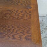 Vintage oak table with tapered legs.