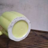 Yellow pitcher in earthenware