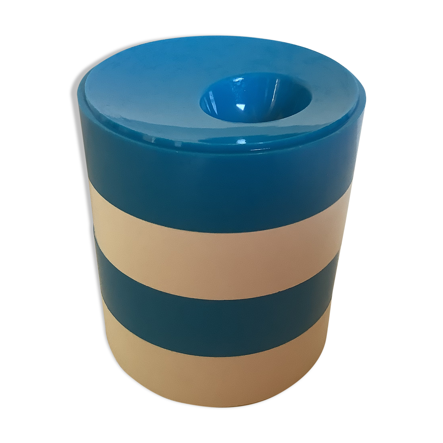 Four round blue and white egg cups from the 1970s.