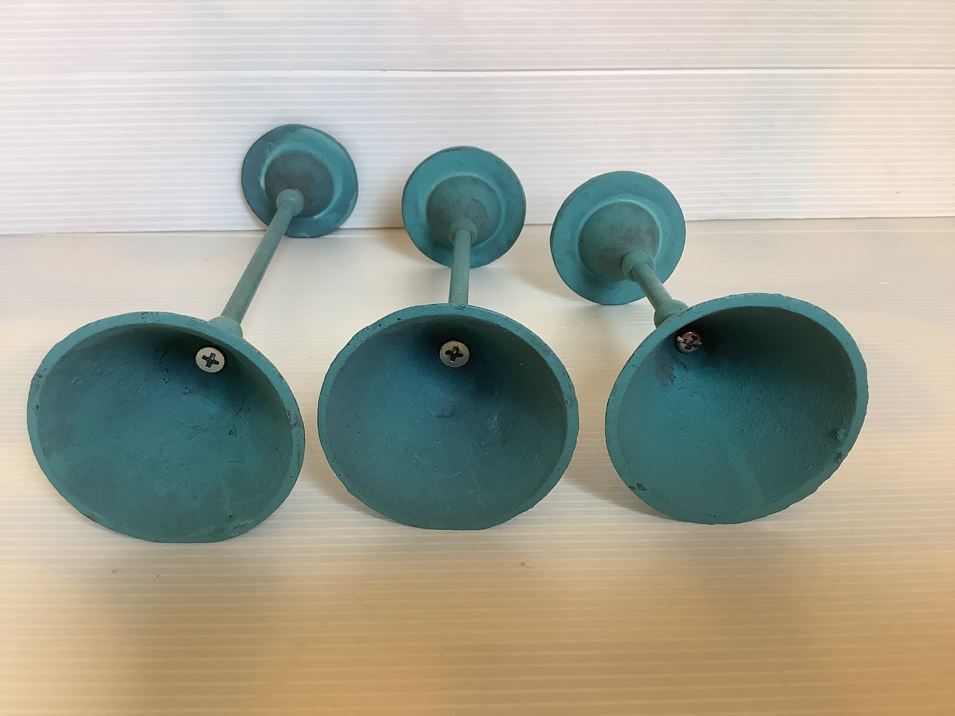 Trio of candlesticks patinated blue green vintage