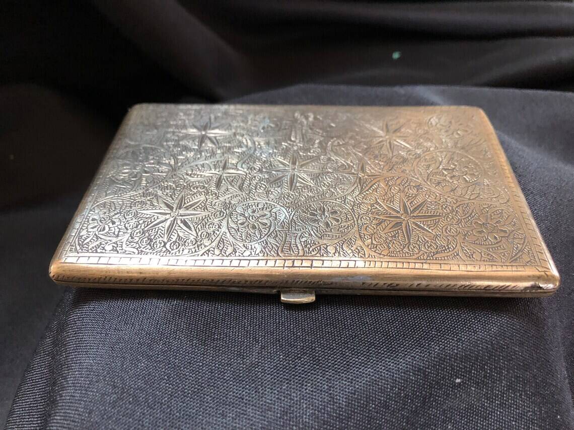 Chiseled bronze cigarette case from the late 19th century