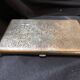 Chiseled bronze cigarette case from the late 19th century