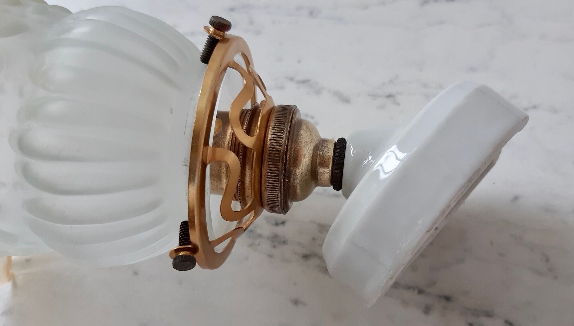 Glass tulip bathroom wall lamp and white porcelain base early XXth