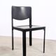 Pair of Matteo Grassi chairs in black saddle leather, 1980s.