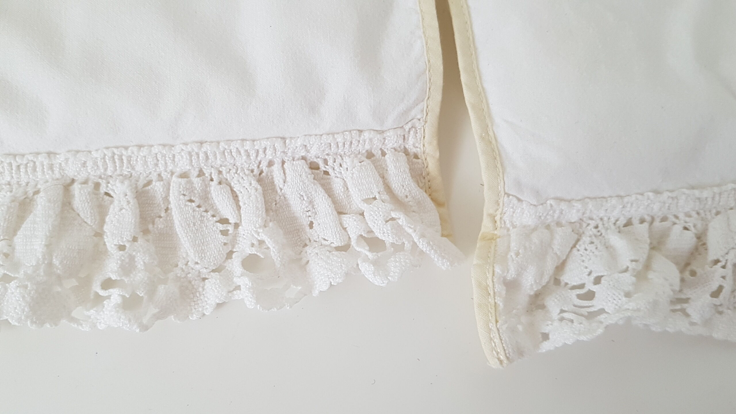 Old rattan bassinet and bedding