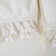 Old rattan bassinet and bedding