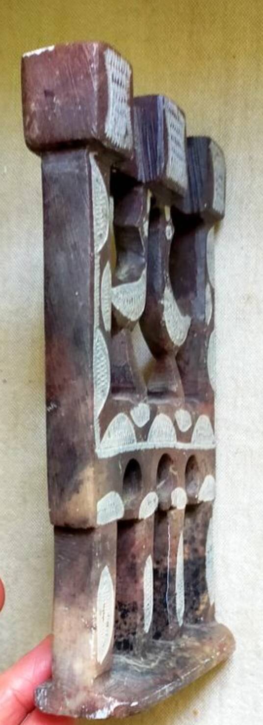 Three-branched stone candlestick adorned with birds, North Africa