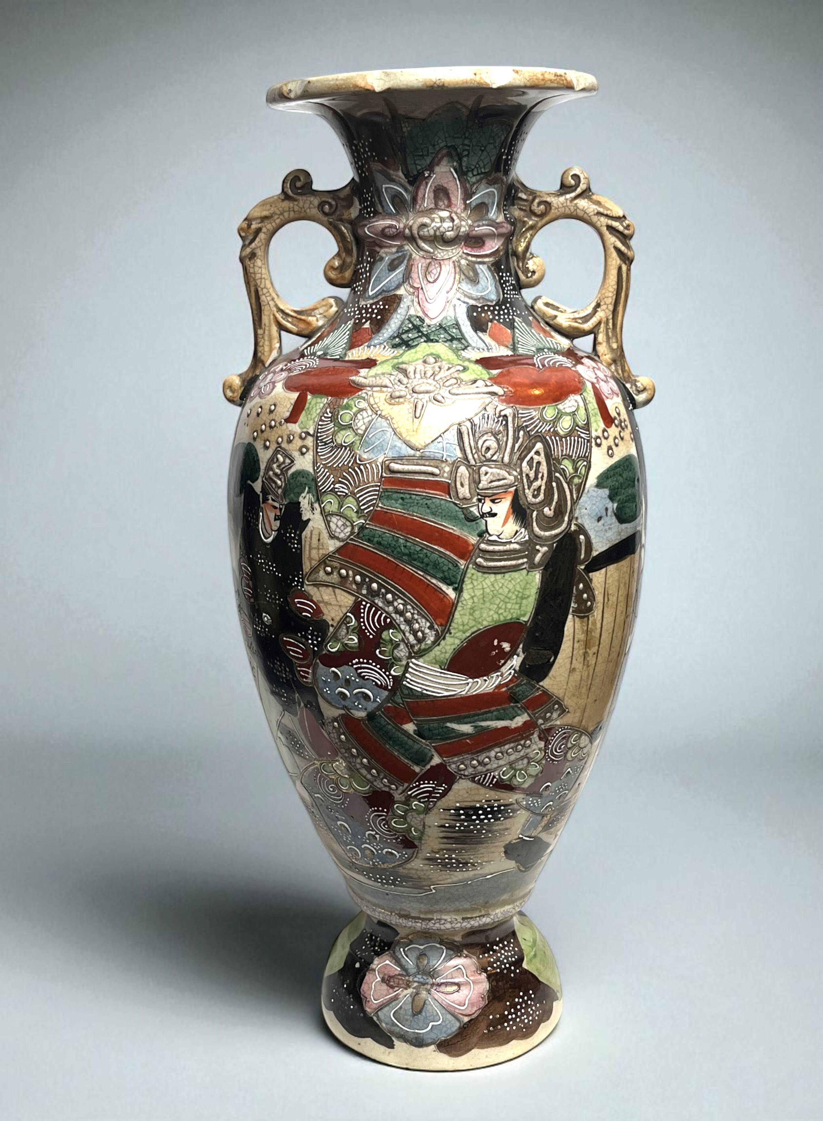 Japan, Satsuma vase with richly decorated handles, signed, early 20th century