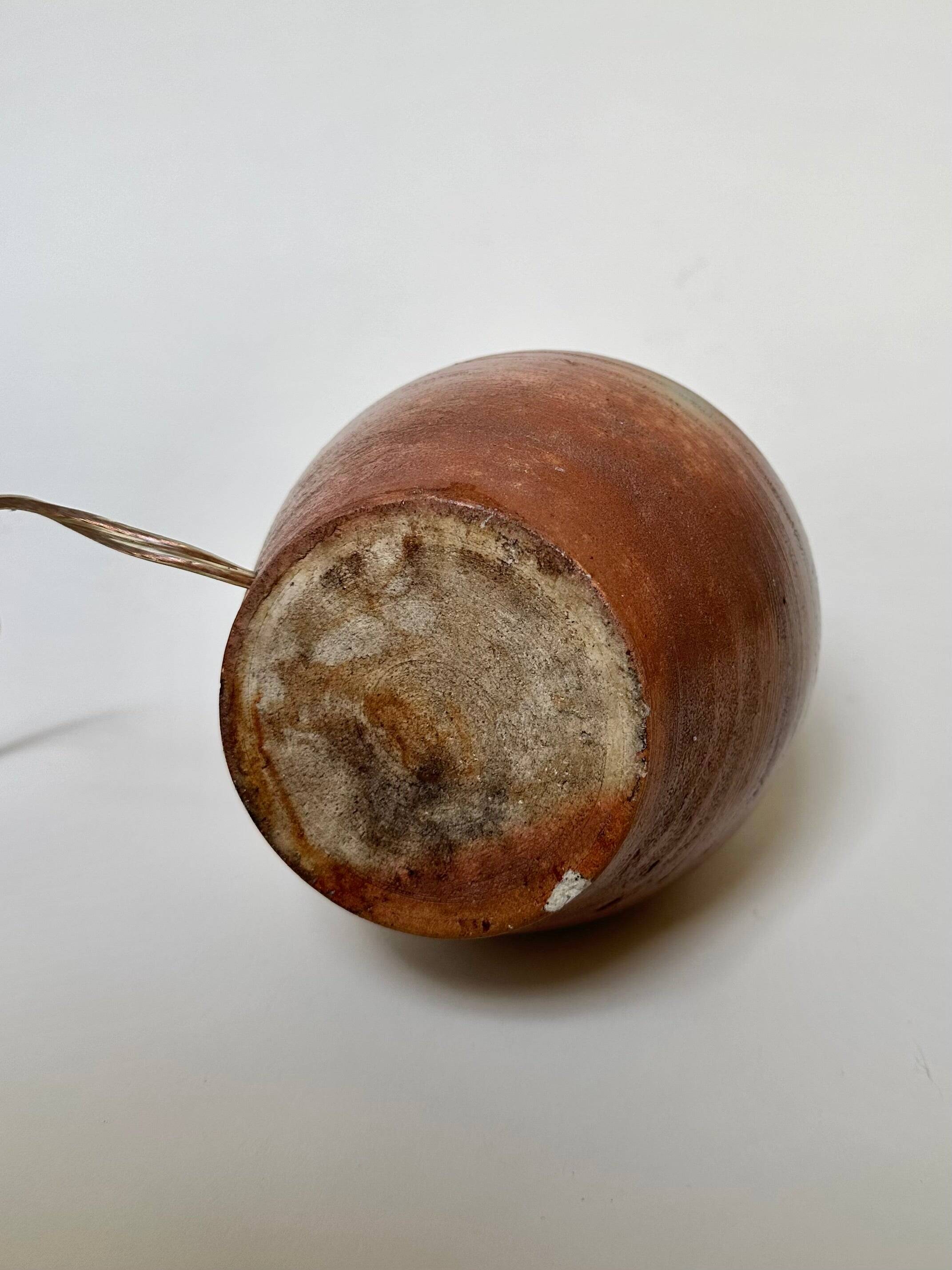 Stone lamp with pleated shade