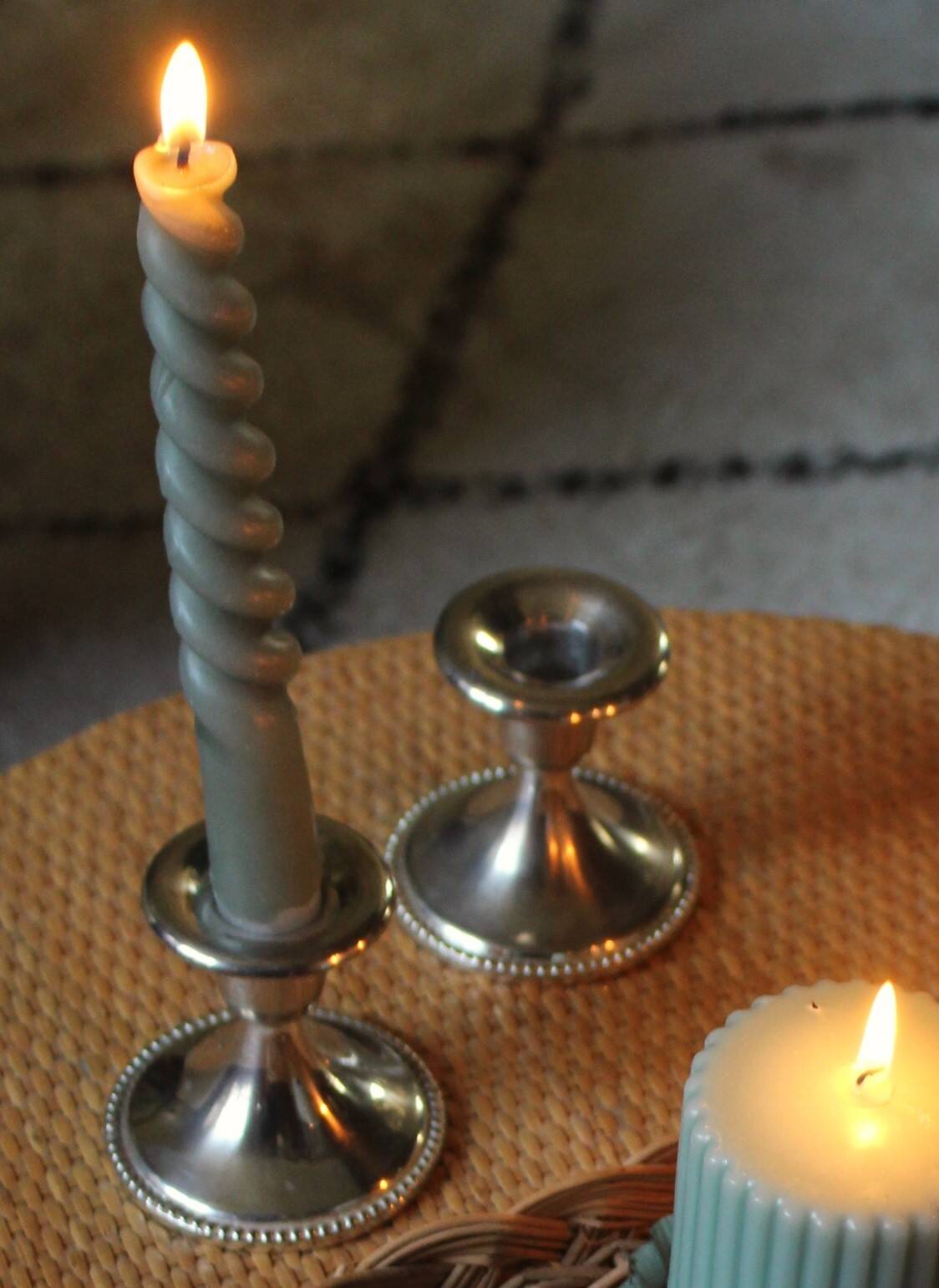 Pair of chrome metal candlesticks