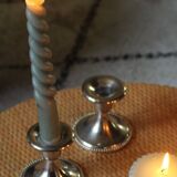 Pair of chrome metal candlesticks