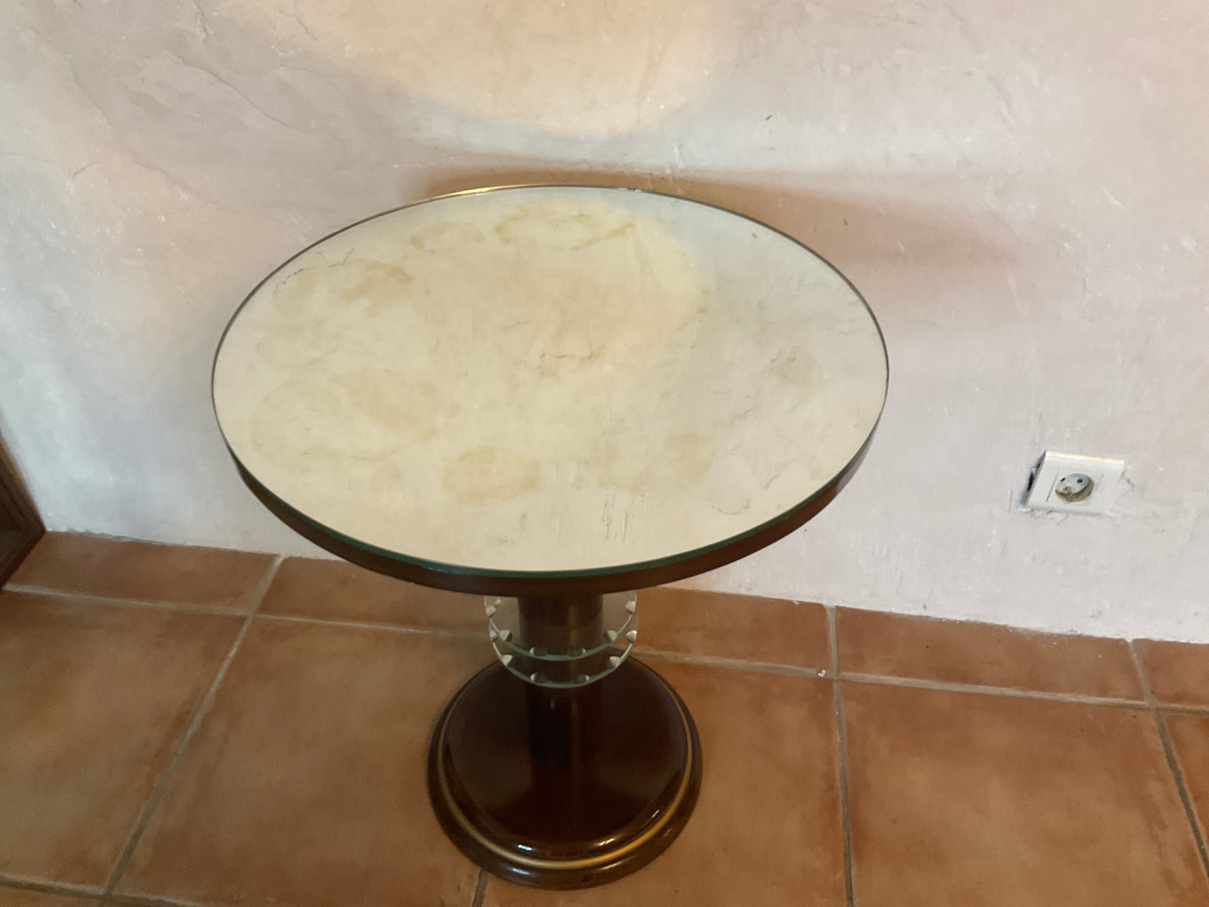 Vintage pedestal table design mirror glass and brass