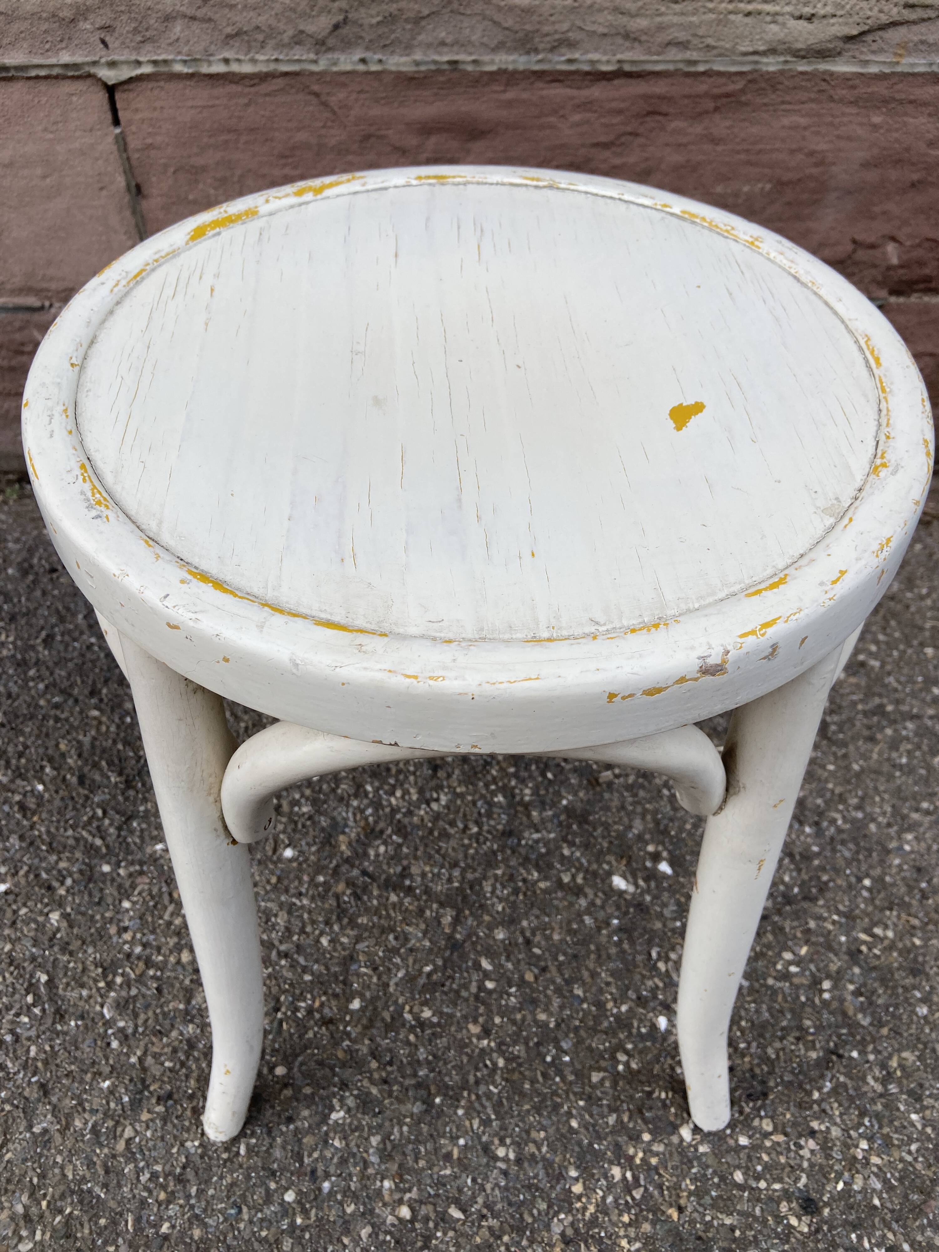 Vintage curved wooden stool