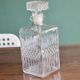 Stretched diamond-tipped glass decanter