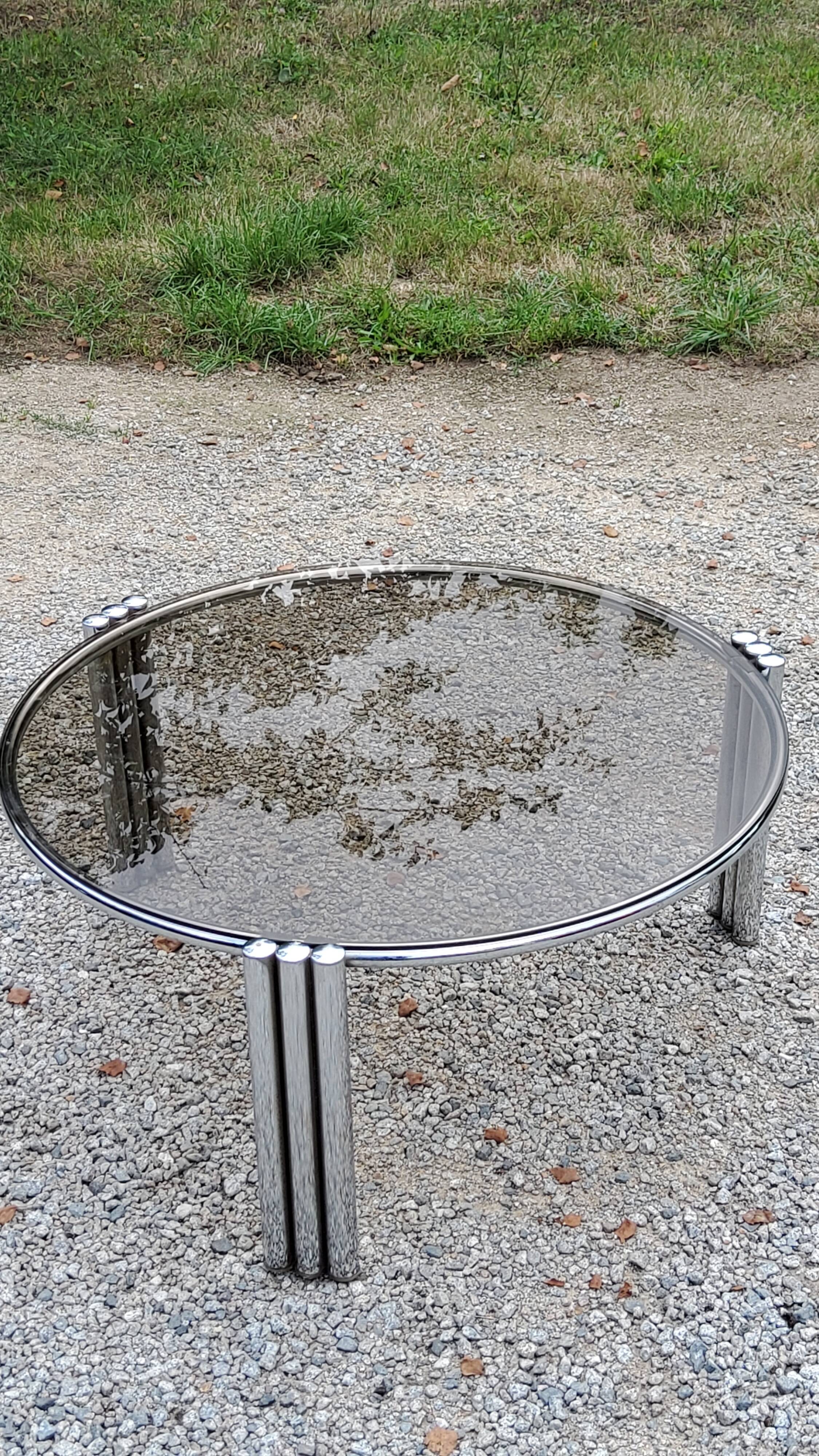 Coffee table design of the 70s smoked glass base chrome Diameter 84cm