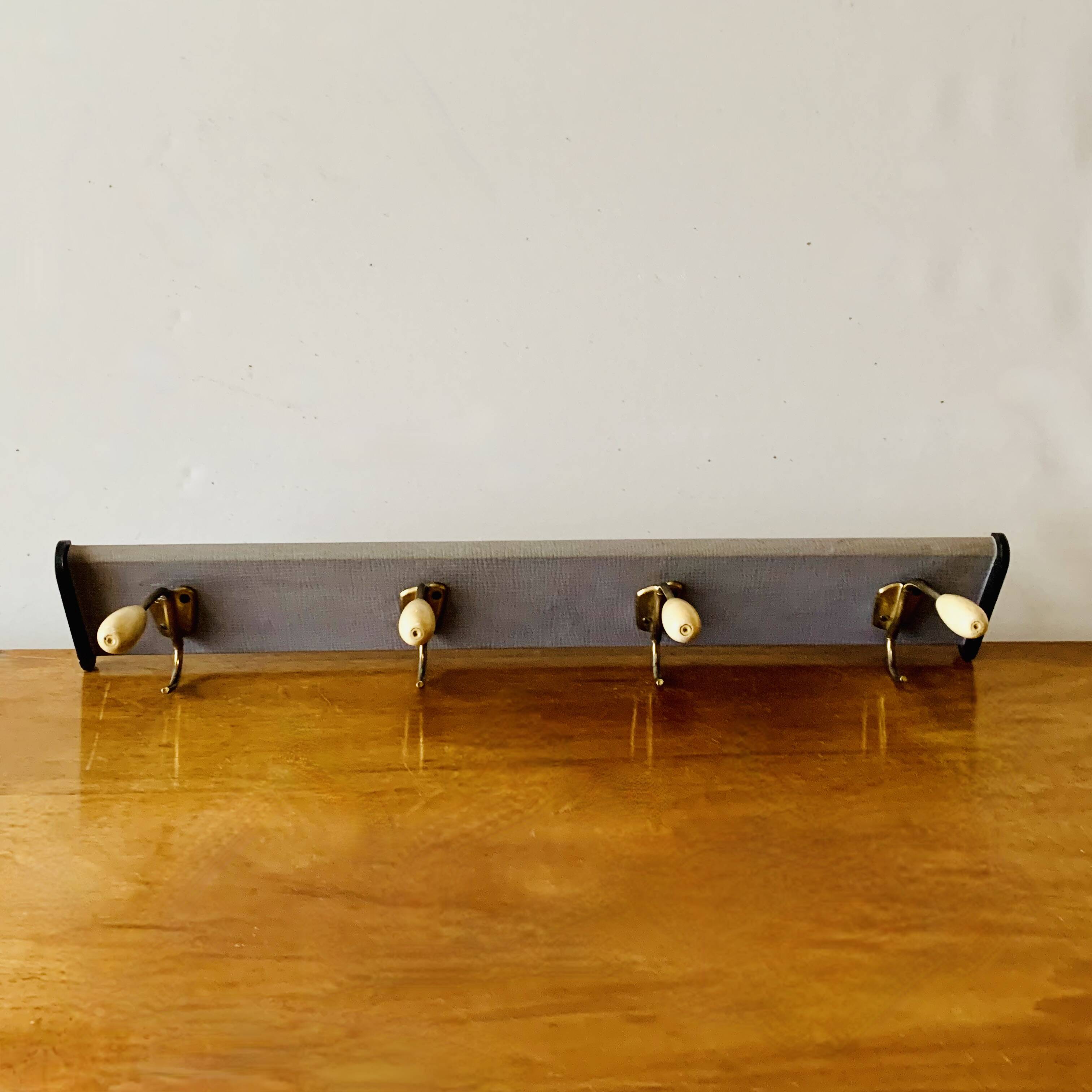 Old wall coat rack - 4 brass hooks