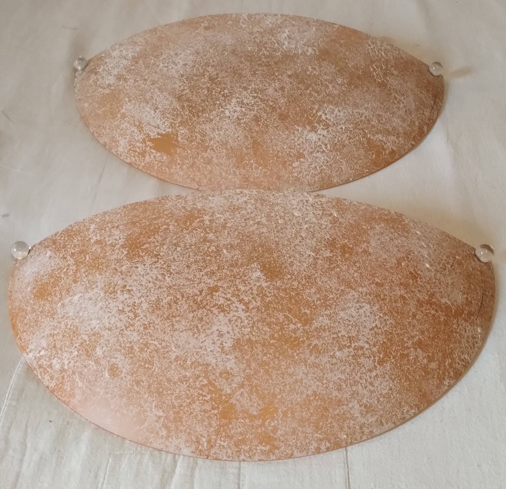 Pair of wall sconces signed L. Drummer