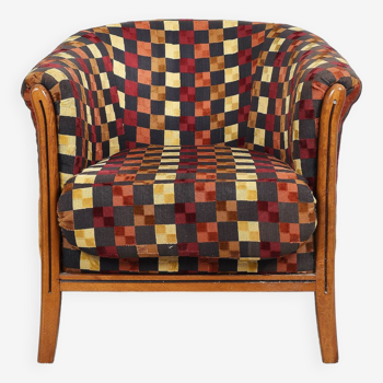 Ancien fauteuil "tonneau", tapisserie rénovée, en velours, très coloré.