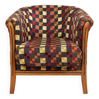 Ancien fauteuil "tonneau", tapisserie rénovée, en velours, très coloré.