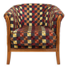 Ancien fauteuil "tonneau", tapisserie rénovée, en velours, très coloré.