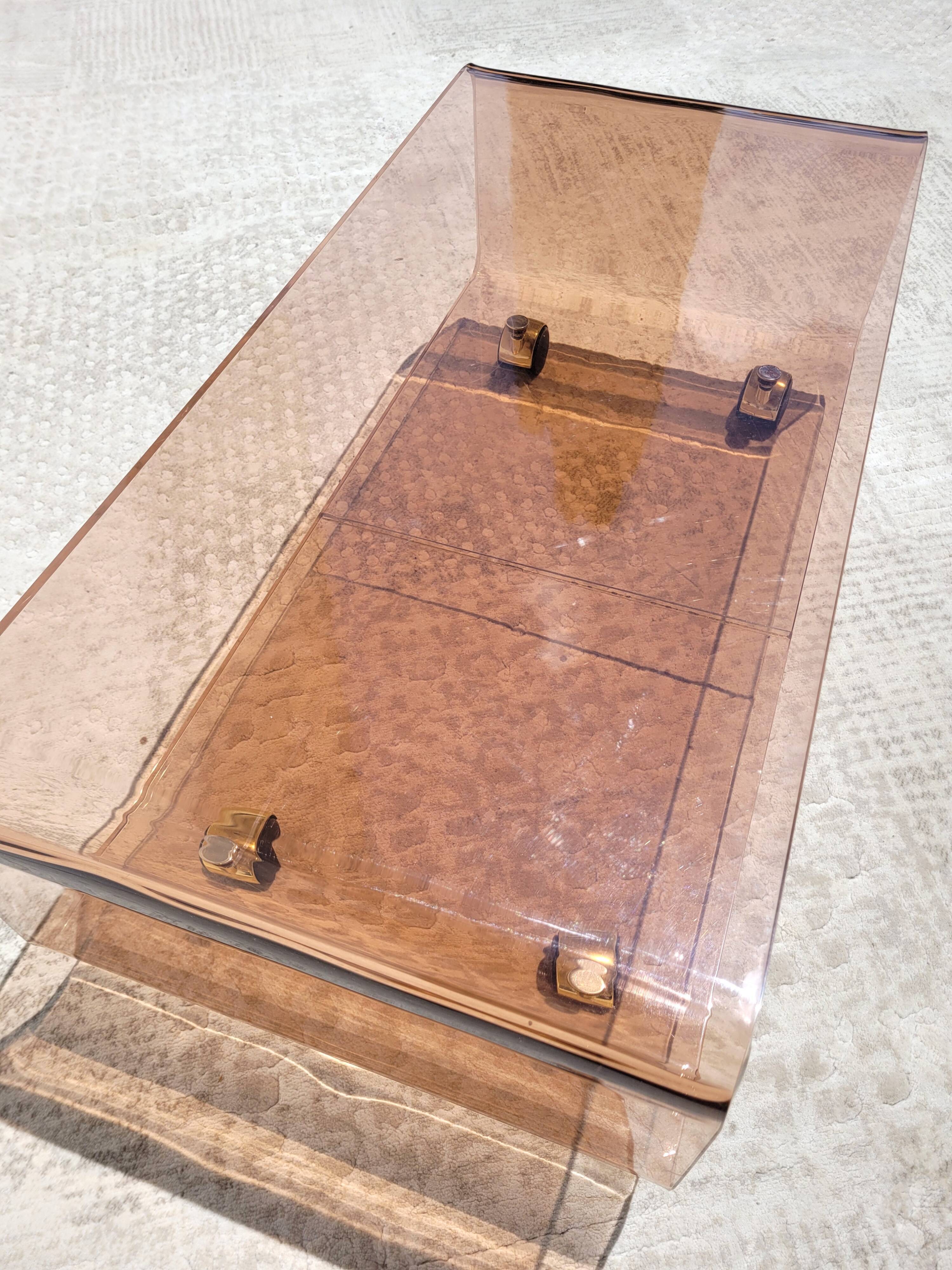 Vintage plexiglass coffee table with wheels 1970