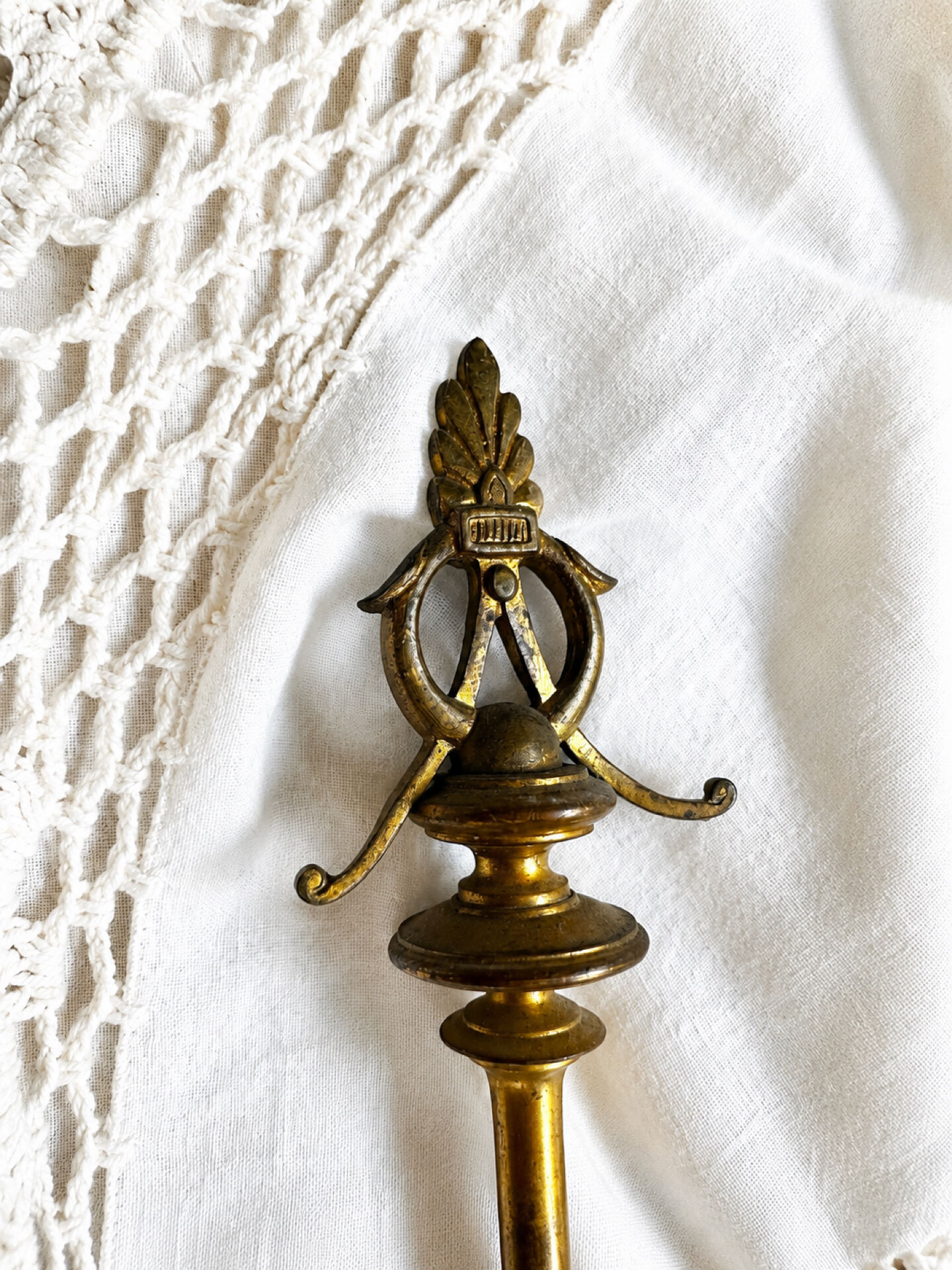 Pair of Empire style candlesticks, patinated brass and black stone.
