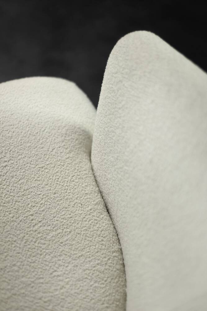 Low oak armchair with modern mid-century Scandinavian fabric and rounded backrest, 1960s.