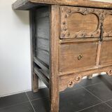 Very old elm wood with carved patterns and ironwork pieces.