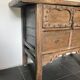 Very old elm wood with carved patterns and ironwork pieces.