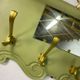Vintage olive green wall coat rack with mirror