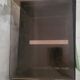 Rectangular piece of furniture or coffee table in smoked plexiglass by Michel Dumas.