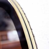 Black and gold 60s round mirror