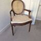 Louis 16 caned medallion armchair with footrest