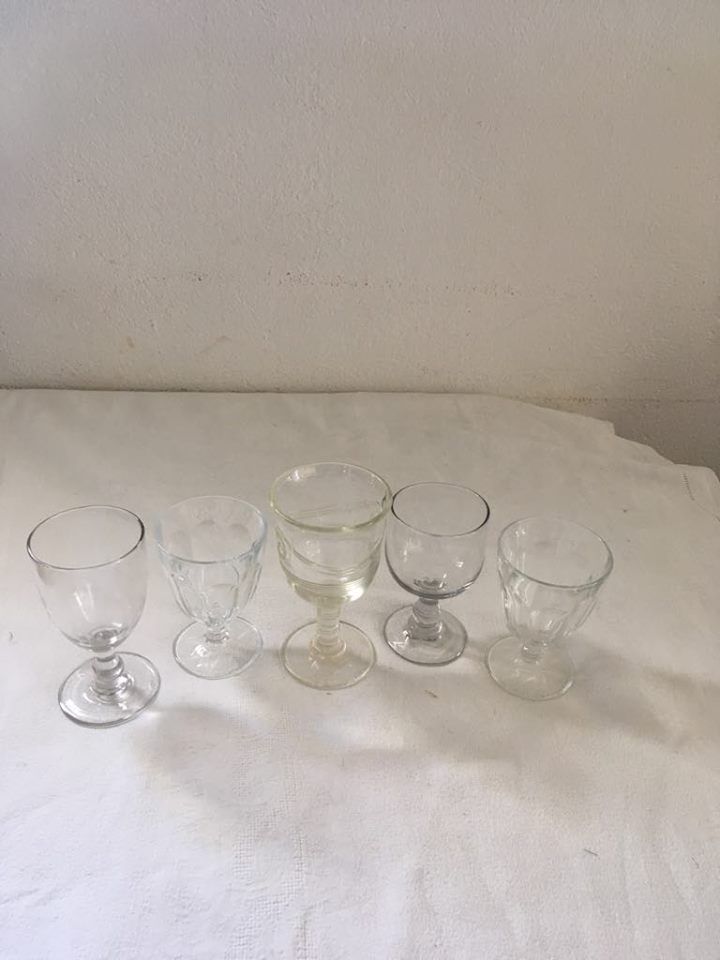 Together five mismatched stemware