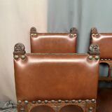 Renaissance-oak and leather style chairs