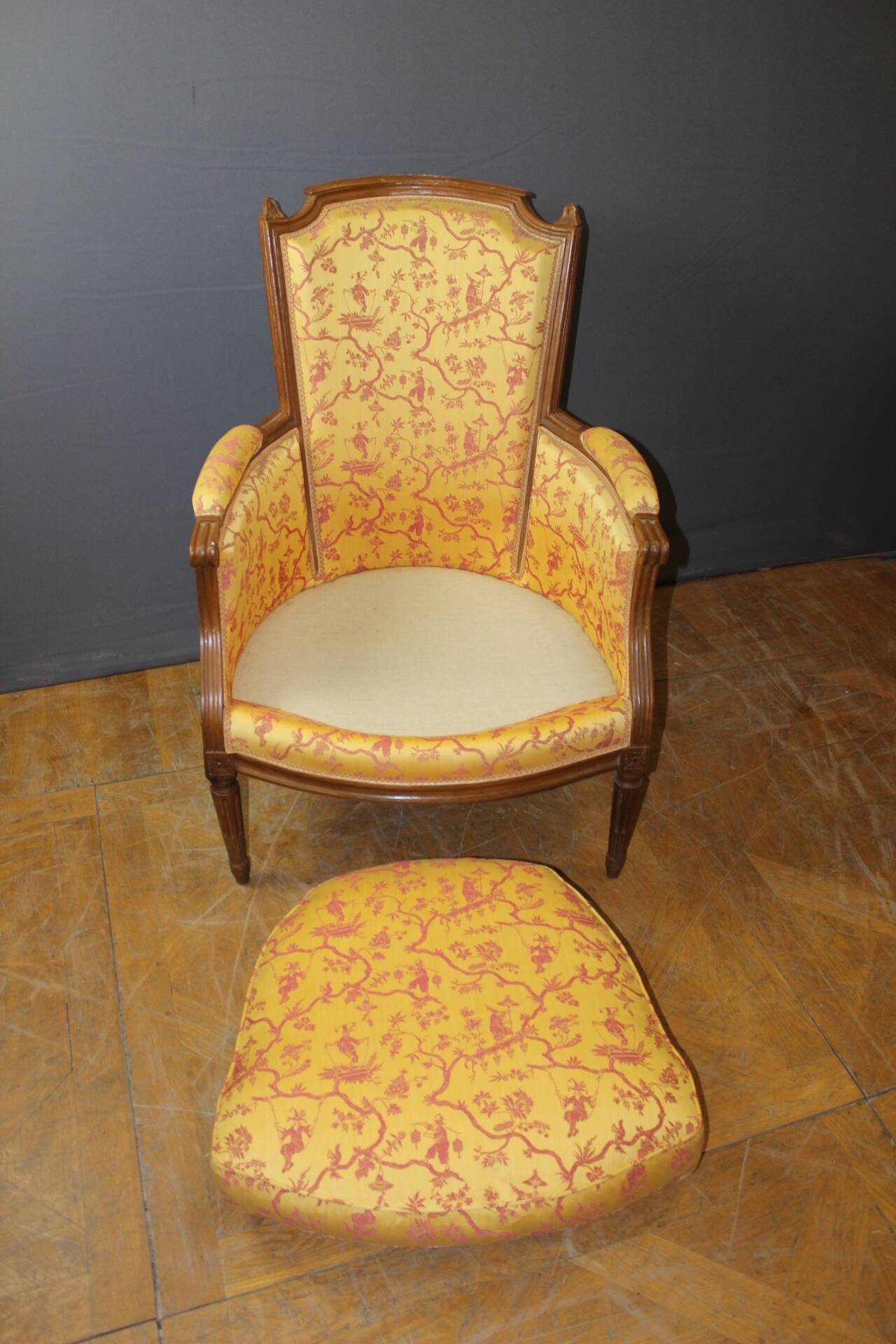 Pair of Louis XVI Bergères in walnut, late 18th century.