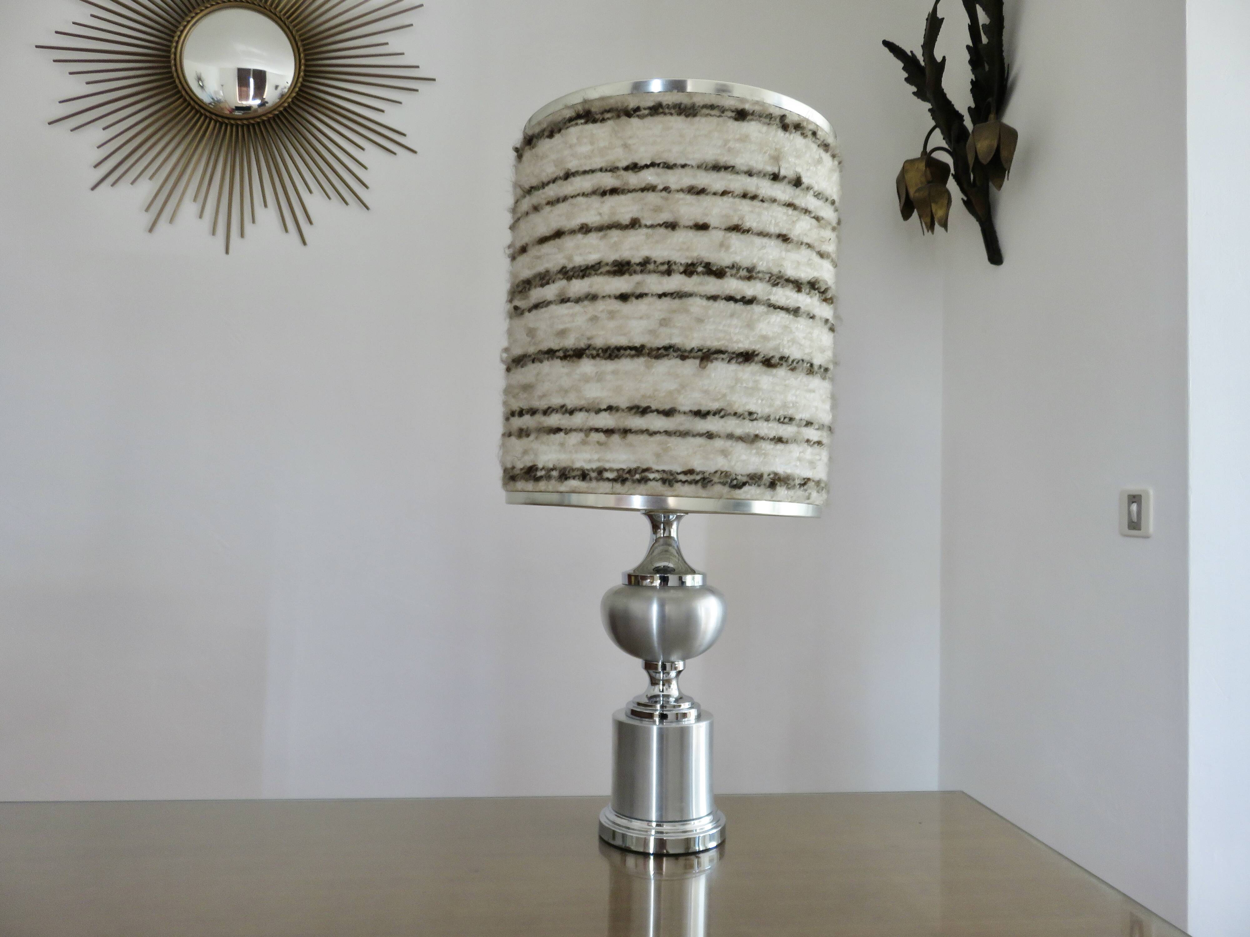 Brushed aluminum and chrome lamp typical of the 70s