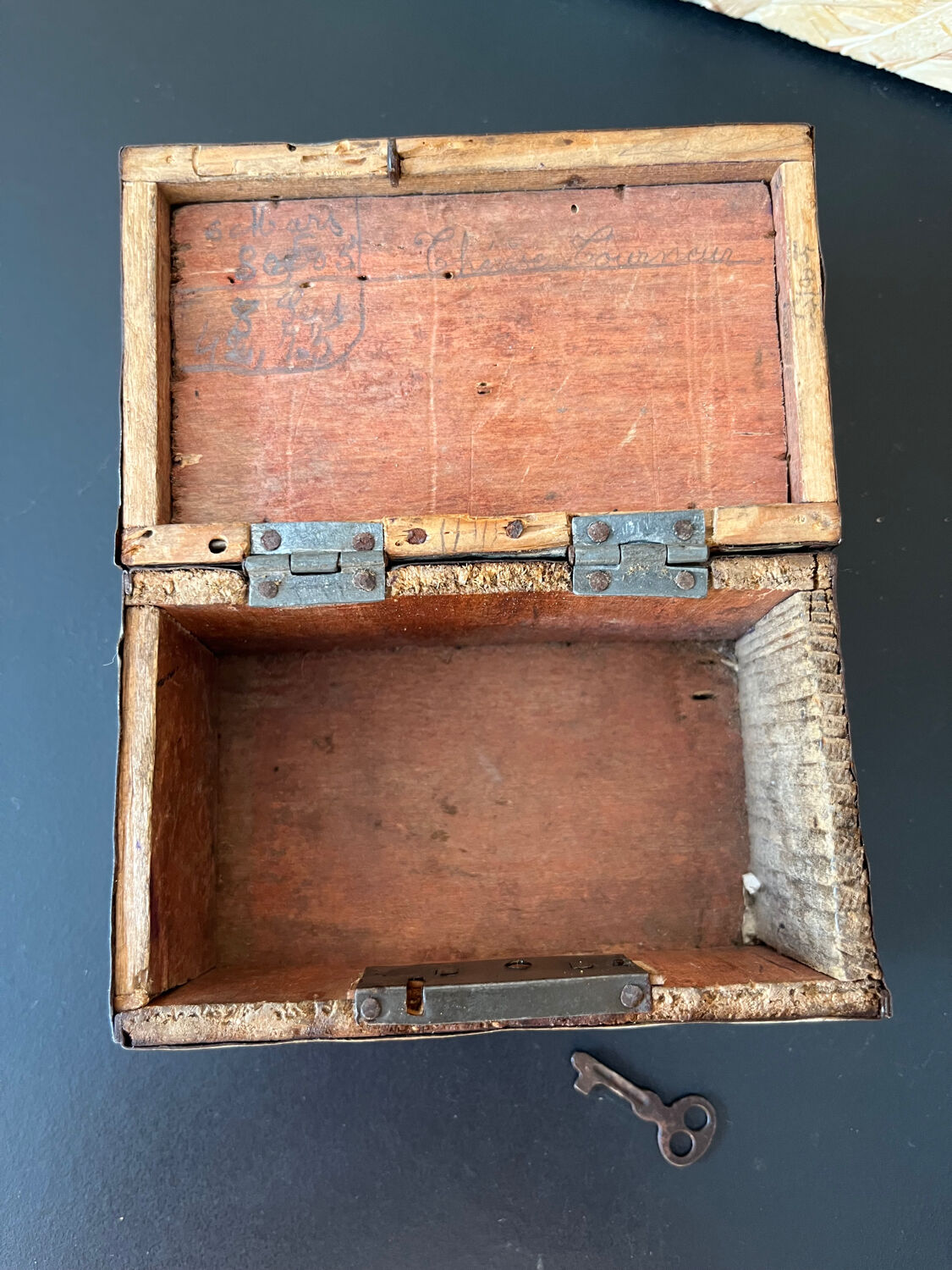Old metal and wood medicine box with key
