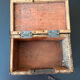 Old metal and wood medicine box with key