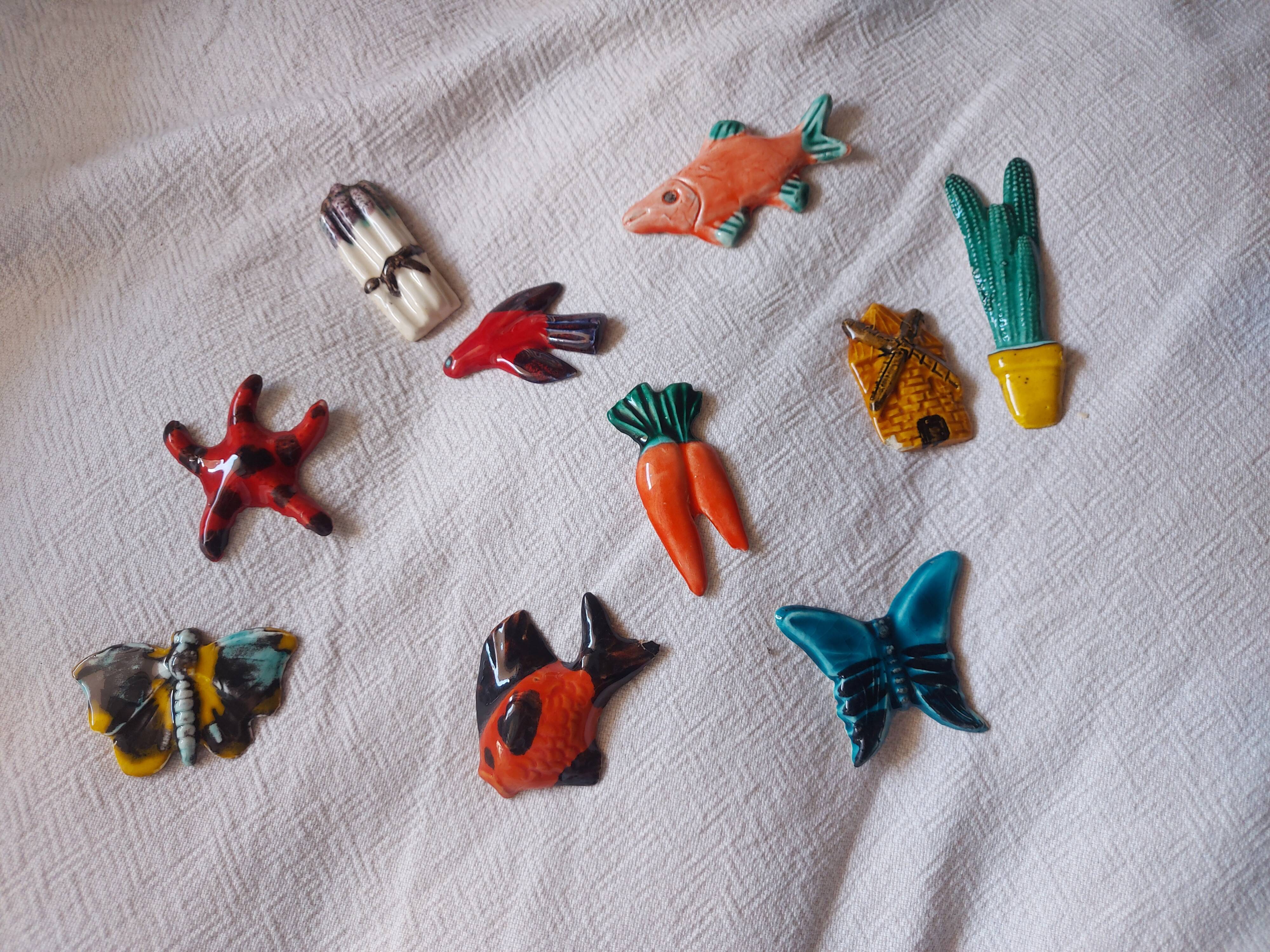 Set of 10 ceramics animals, fish, butterfly