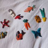 Set of 10 ceramics animals, fish, butterfly