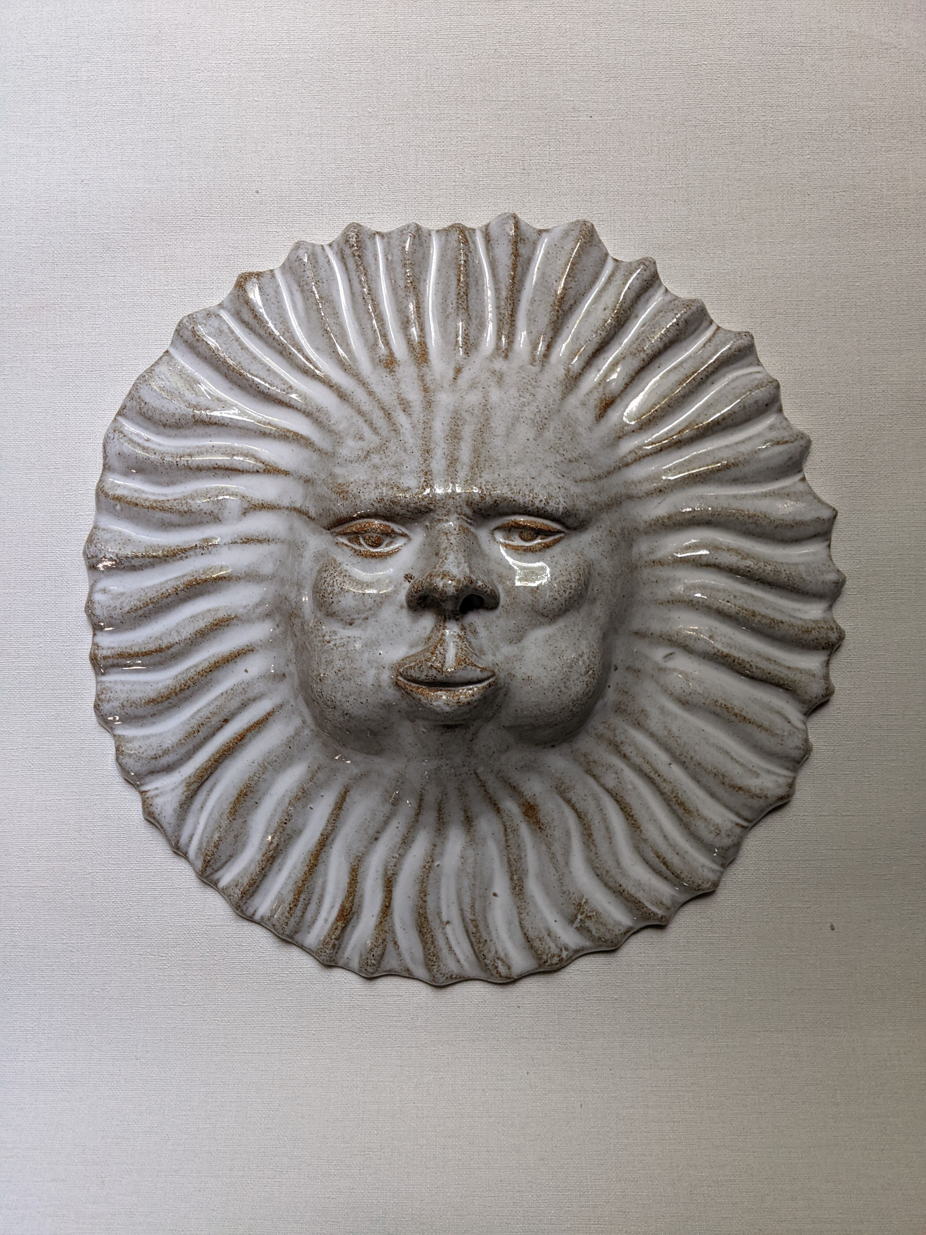 Handcrafted ceramic wall sun